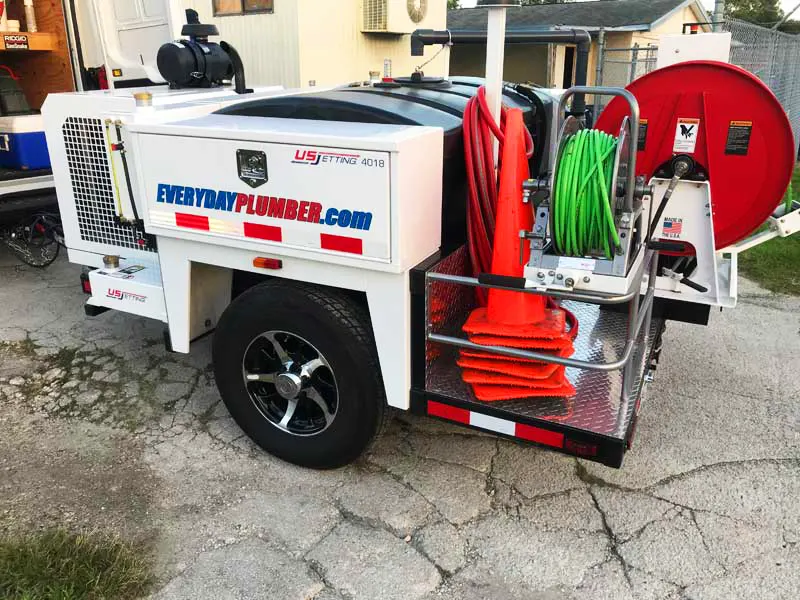 hydro-jetting-trailer-tampa-commercial-drain-cleaning-everydayplumber Hydro jetting trailer with high-pressure hoses for commercial drain cleaning