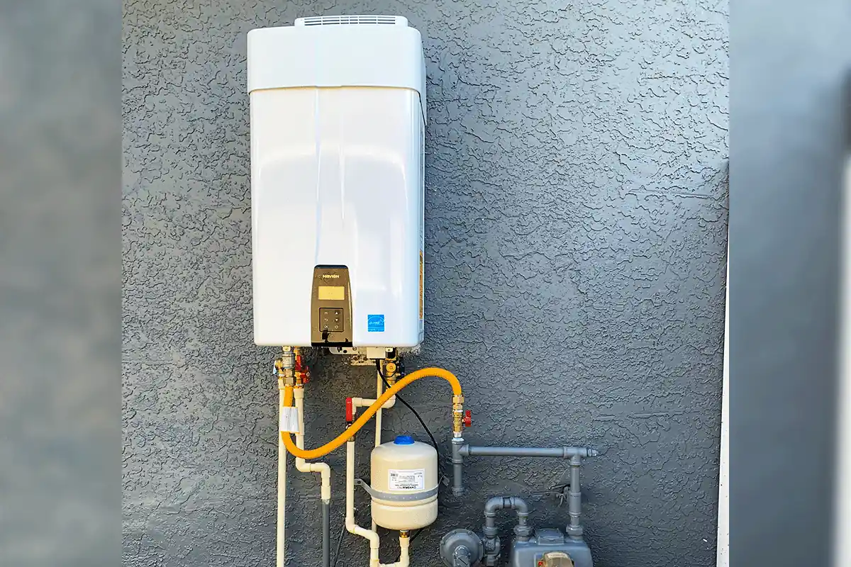 Tankless water heater installed on the exterior wall of a Tampa Bay home